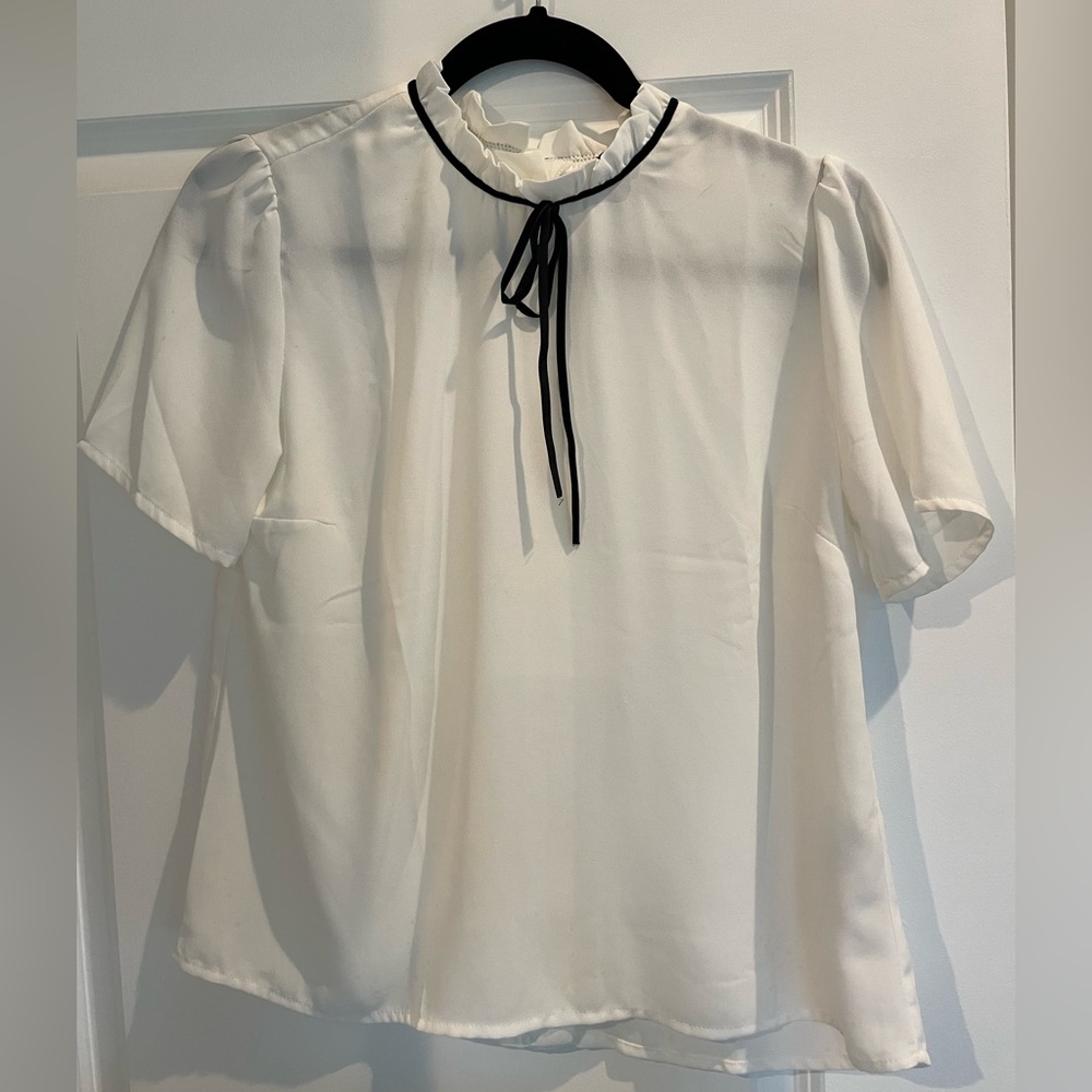 Forever 21. White short sleeve blouse size small.